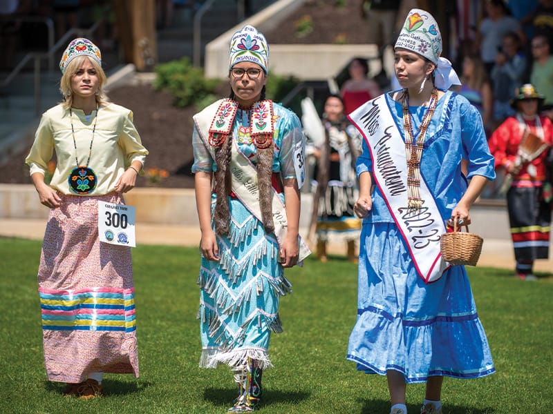 GunLake-Language-Culture A pow wow or celebration with 3 people