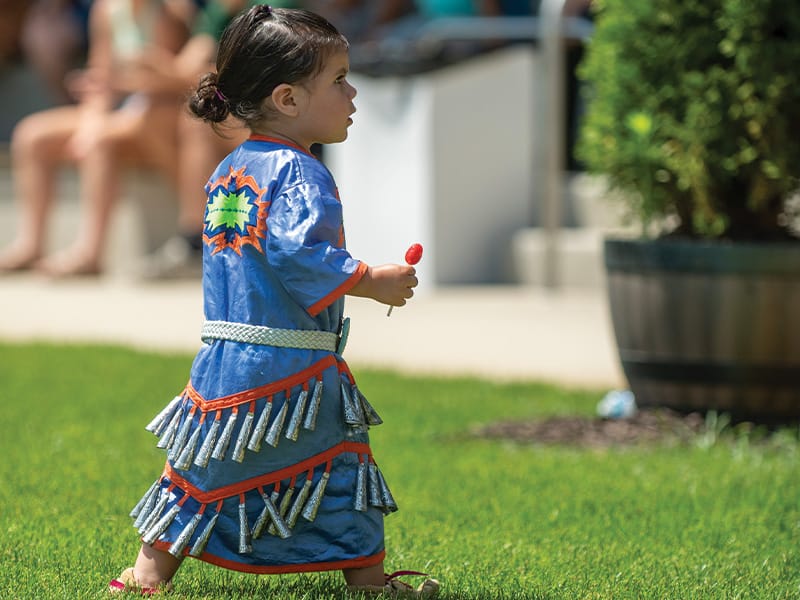 GunLake-Language-Culture1 A young child with a sucker